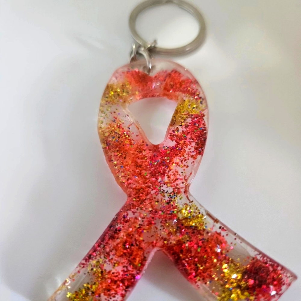 Red and Gold glitter resin ribbon Keychain.